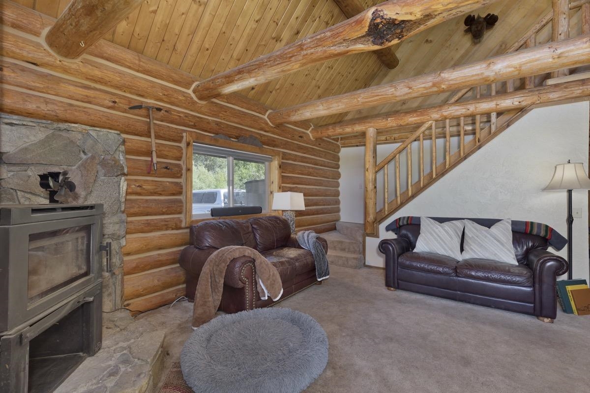 64 Carson Street June Lake, CA 93529 - Photo 10 of 47 a bedroom with furniture and a ceiling fan