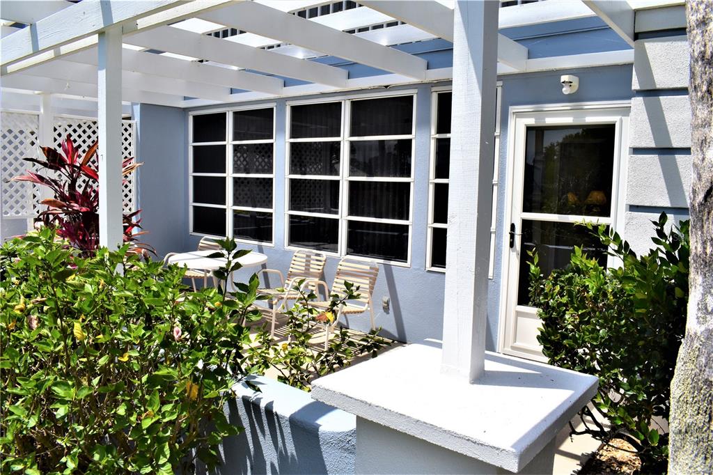 448 Cerromar Road, Unit 189 Venice, FL 34293 - Photo 26 of 48 a view of a house with a table and chair