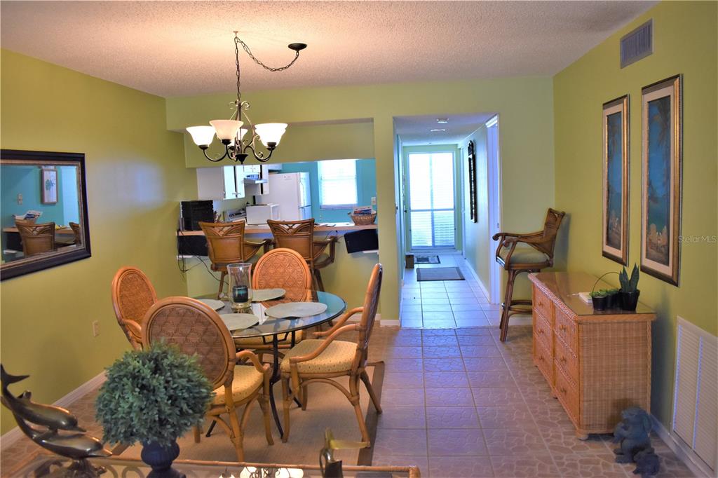 448 Cerromar Road, Unit 189 Venice, FL 34293 - Photo 28 of 48 a view of a dining room with furniture