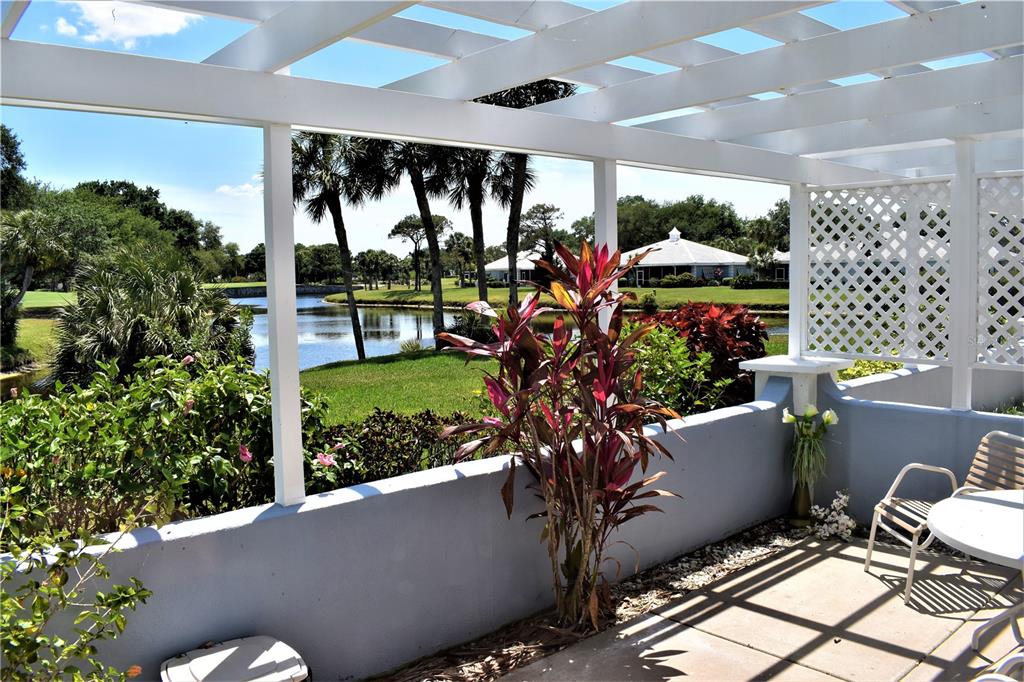 448 Cerromar Road, Unit 189 Venice, FL 34293 - Photo 3 of 48 a view of a porch with furniture and garden