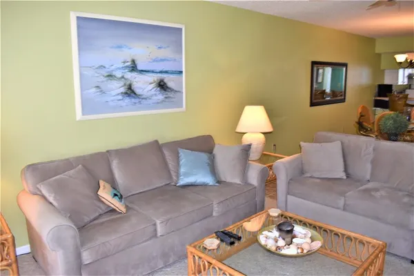 a living room with furniture and a couch