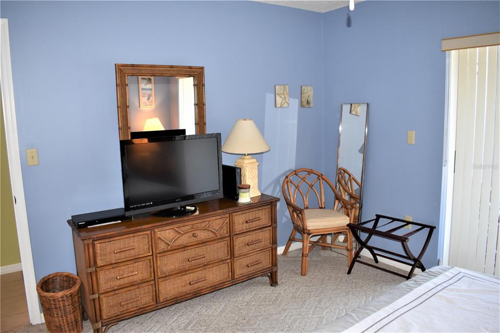 448 Cerromar Road, Unit 189 Venice, FL 34293 - Photo 40 of 48 a living room with furniture and a flat screen tv