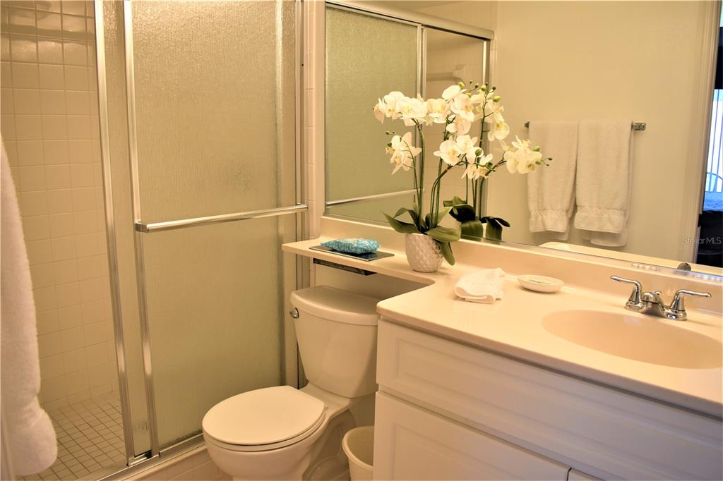448 Cerromar Road, Unit 189 Venice, FL 34293 - Photo 43 of 48 a bathroom with a sink toilet and shower