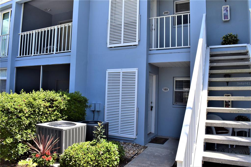448 Cerromar Road, Unit 189 Venice, FL 34293 - Photo 47 of 48 a front view of a house with a garden