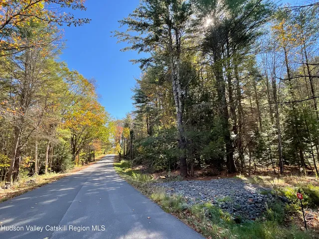 a view of a building and trees