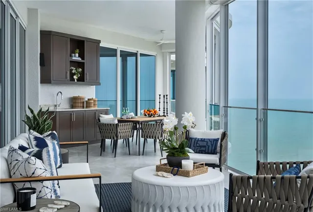 a bathroom with a granite countertop sink a mirror and shower