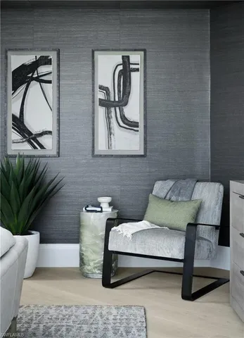 a view of a swimming pool with an outdoor seating