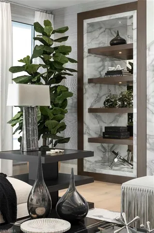 a kitchen with a table chairs stove and cabinets