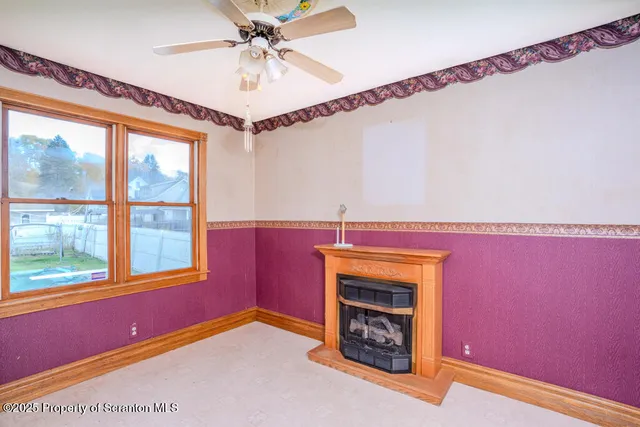 a kitchen with stainless steel appliances kitchen island granite countertop a stove and a refrigerator