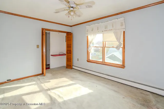 a view of a hallway with a chandelier