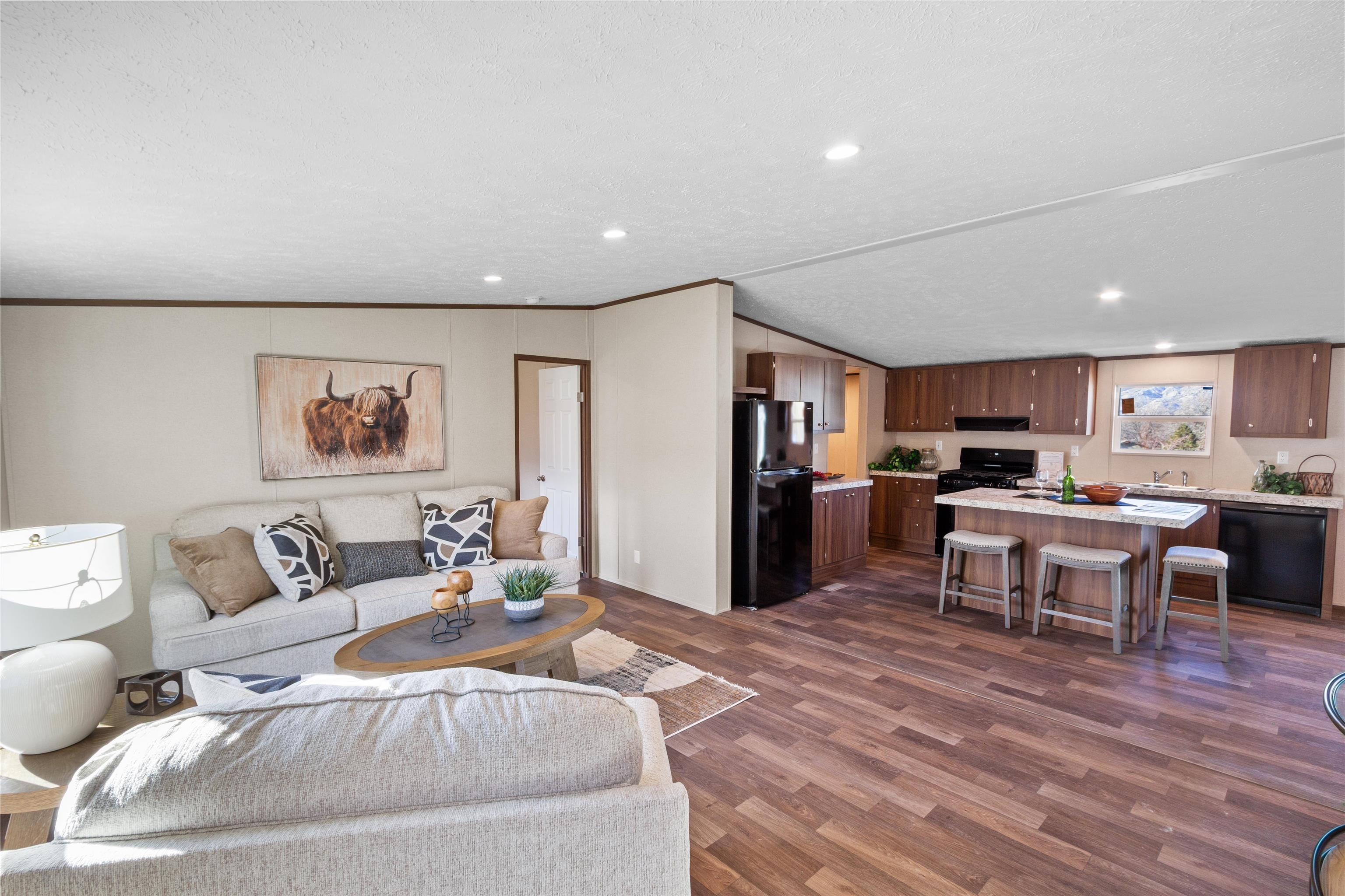 133 West Carson Circle Parachute, CO 81635 - Photo 2 of 25 a living room with furniture kitchen view and a dining table