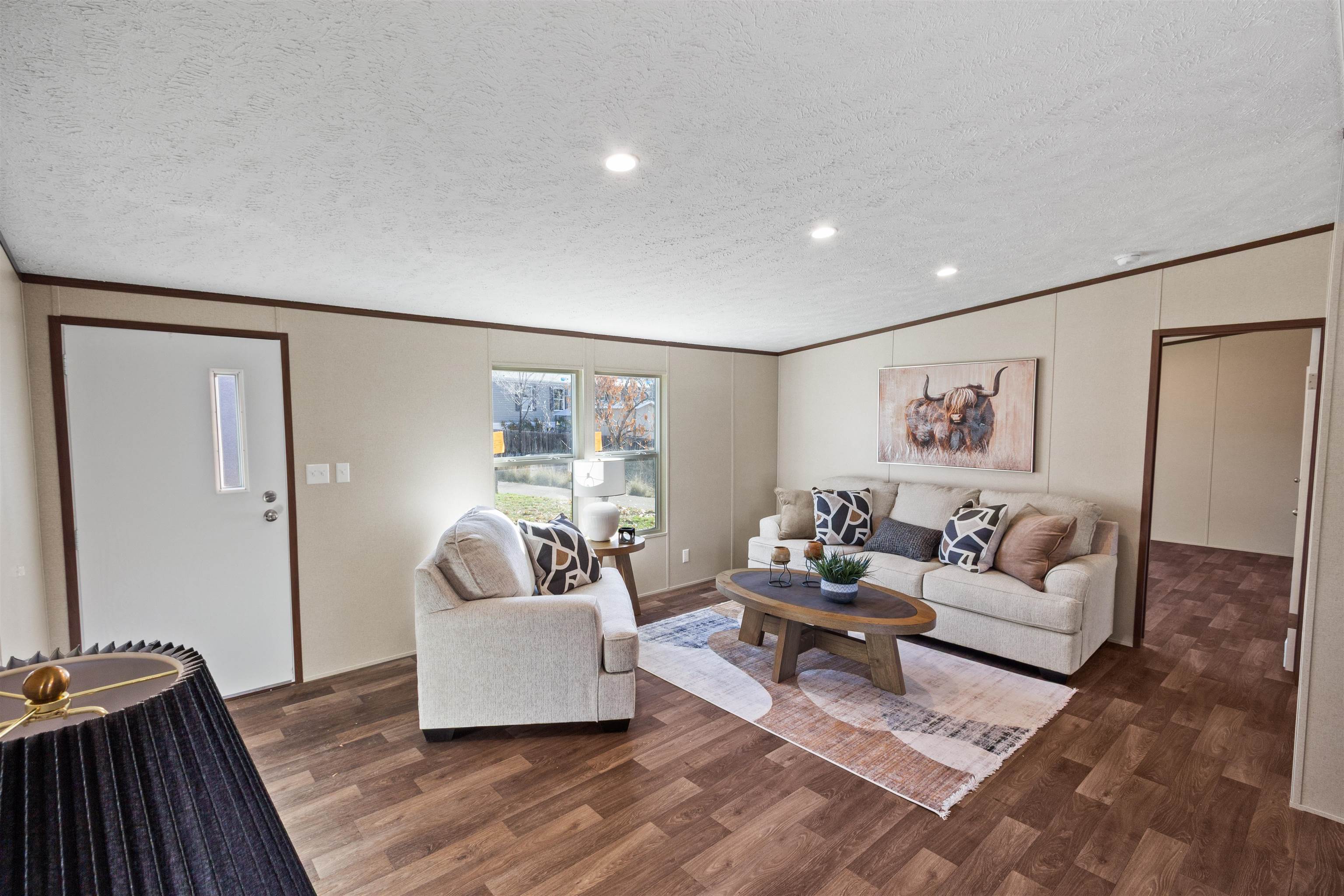 133 West Carson Circle Parachute, CO 81635 - Photo 3 of 25 a living room with furniture and wooden floor