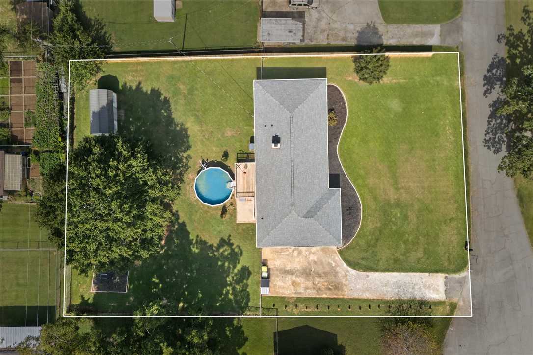 118 Bryson Road Anderson, SC 29625 - Photo 36 of 36 An aerial perspective showcases the generous yard, shingle roof, and inviting backyard pool.