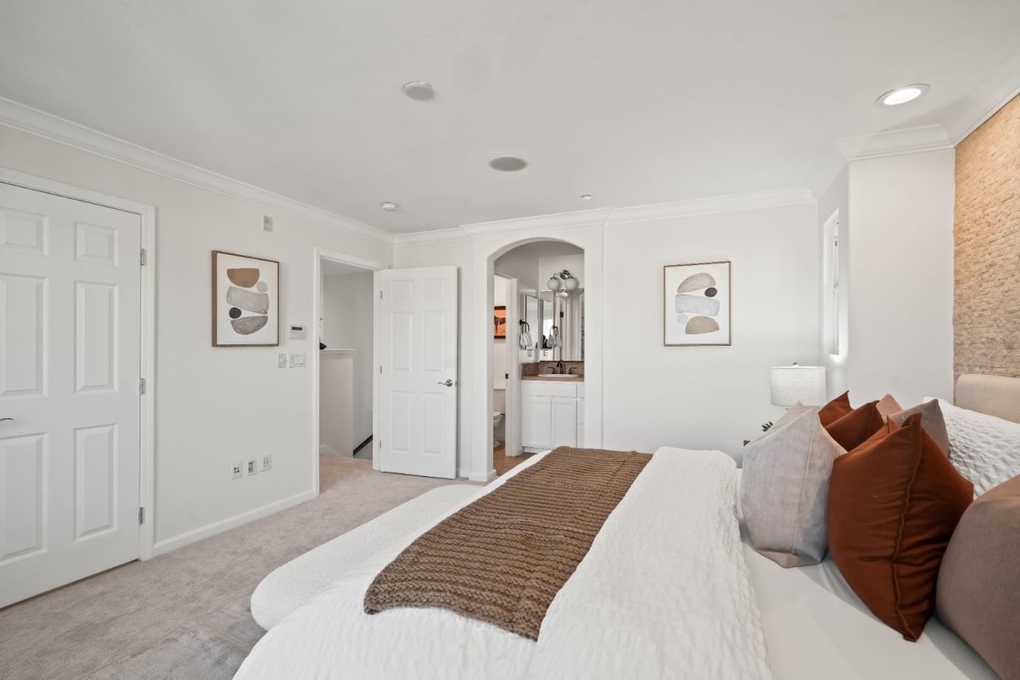 451 Chagall Street Mountain View, CA 94041 - Photo 33 of 58 a bedroom with a large bed and a chandelier