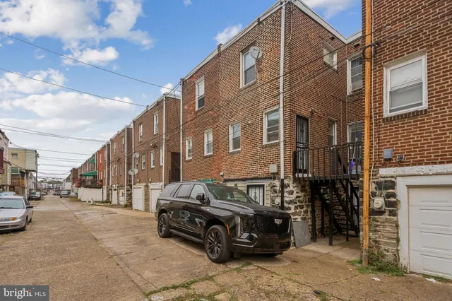 a car parked in front of a building