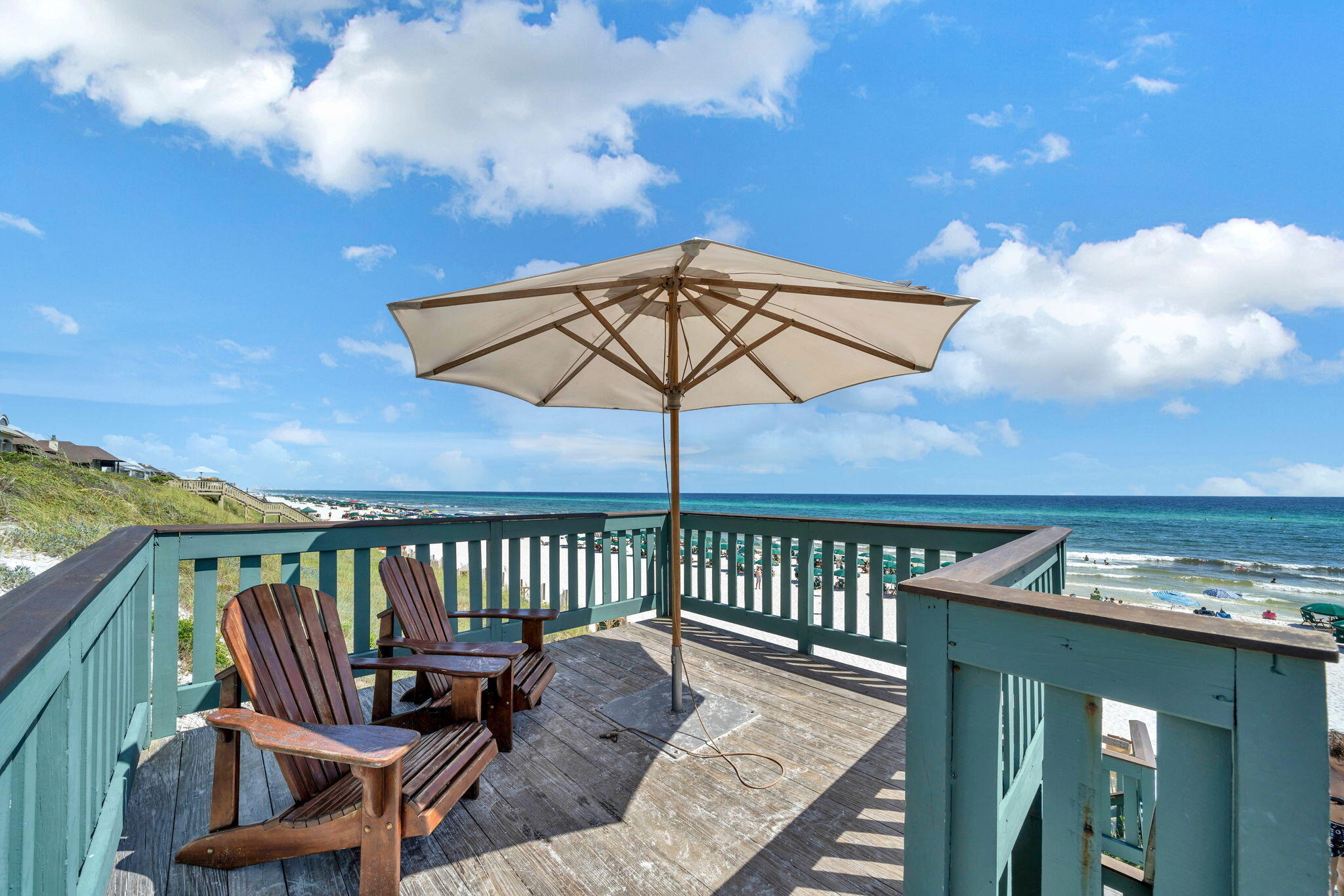 82 South Barrett Square, Unit 3E Inlet Beach, FL 32461 - Photo 52 of 56 a view of a balcony with furniture and umbrella