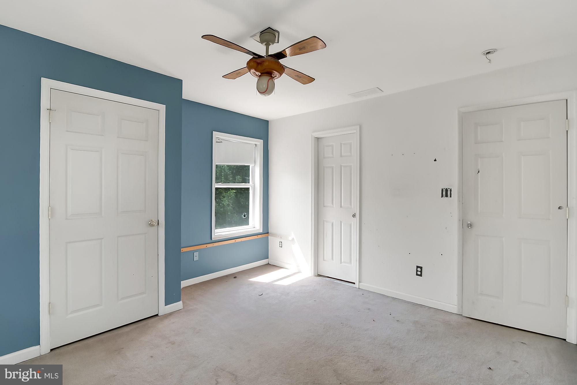 1211 Hillside Road Pasadena, MD 21122 - Photo 13 of 24 a view of a livingroom with a ceiling fan