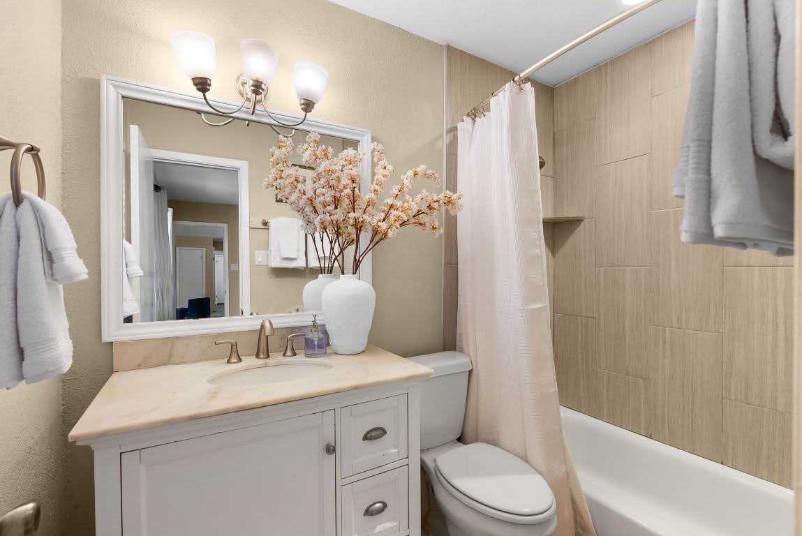 2320 Montclaire Street, Unit A Austin, TX 78704 - Photo 16 of 36 a bathroom with a sink toilet and shower