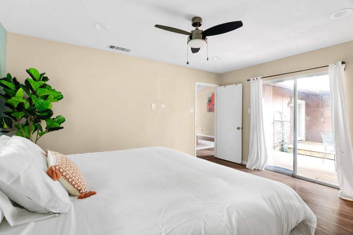 2320 Montclaire Street, Unit A Austin, TX 78704 - Photo 17 of 36 a bedroom with a large bed and a window