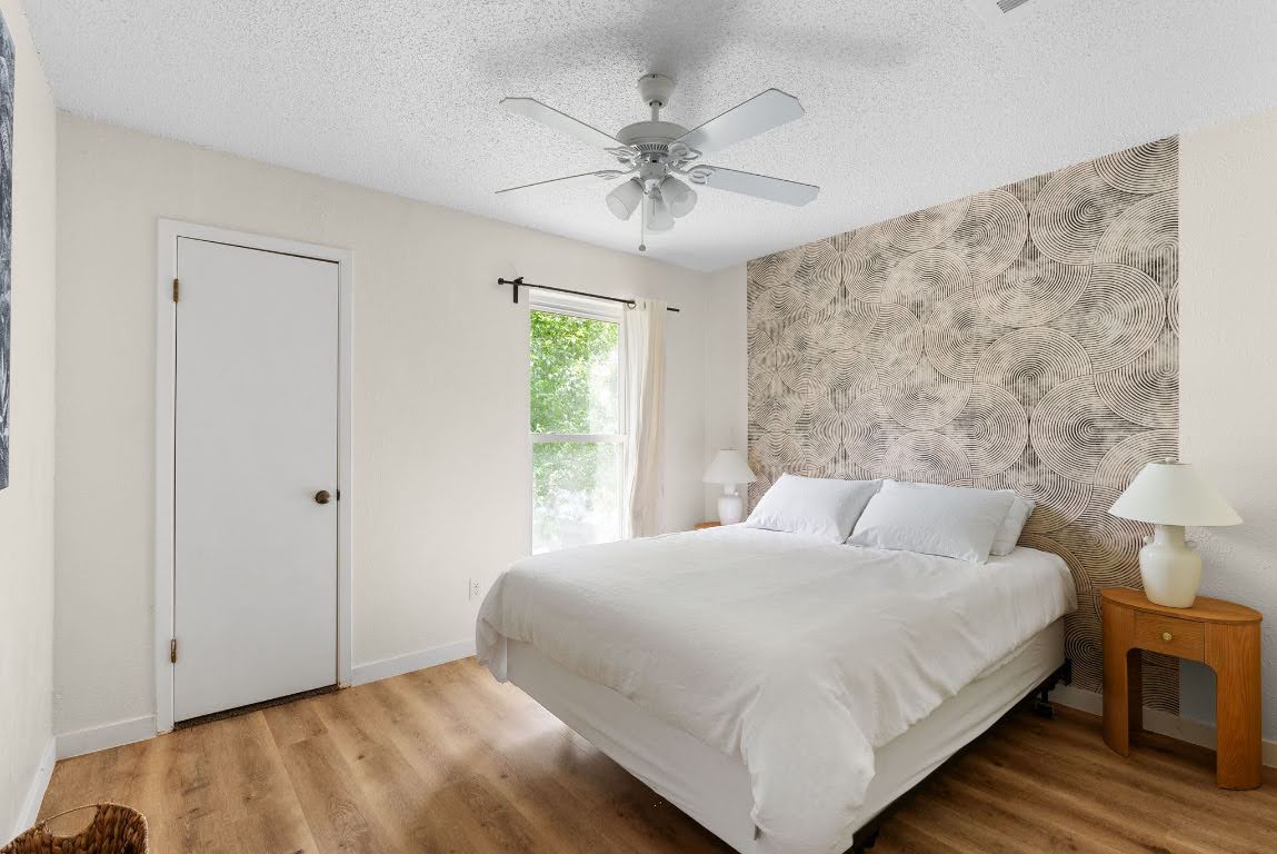 2320 Montclaire Street, Unit A Austin, TX 78704 - Photo 22 of 36 a bedroom with a bed and a window