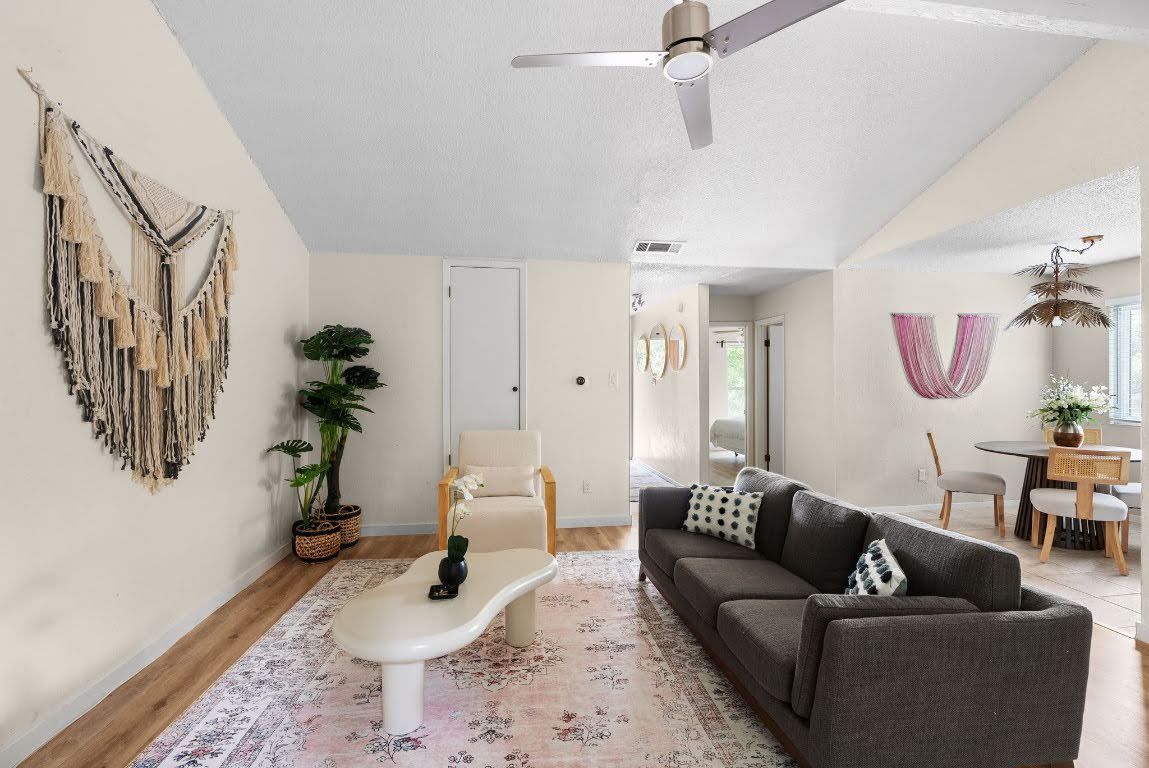 2320 Montclaire Street, Unit A Austin, TX 78704 - Photo 32 of 36 a living room with furniture or couch and a potted plant
