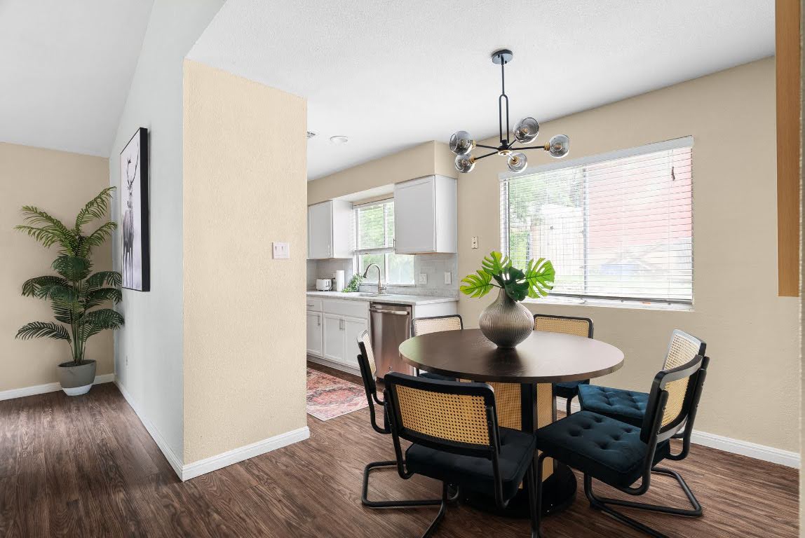 2320 Montclaire Street, Unit A Austin, TX 78704 - Photo 4 of 36 a dining room with furniture potted plants and wooden floor