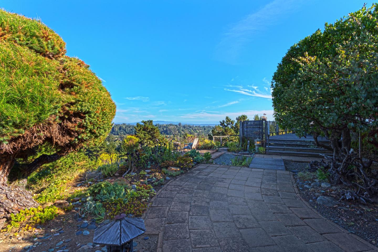 270 Hames Road, Unit 42 Corralitos, CA 95076 - Photo 2 of 25 a view of a garden with an outdoor space