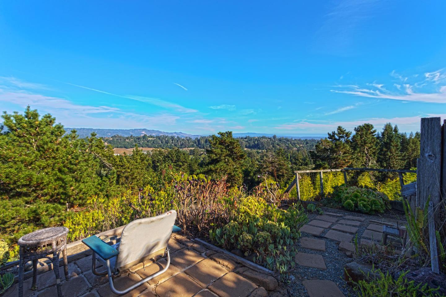 270 Hames Road, Unit 42 Corralitos, CA 95076 - Photo 3 of 25 a view of a balcony with chairs