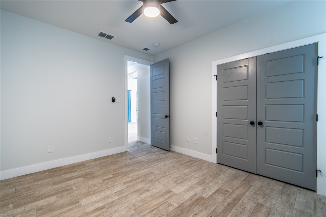 4801 Del Paseo Street Corpus Christi, TX 78411 - Photo 32 of 36 wooden floor in an empty room