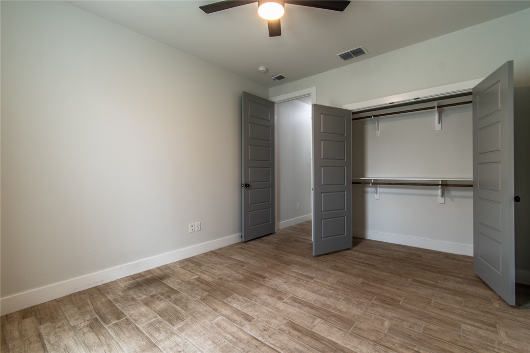 4801 Del Paseo Street Corpus Christi, TX 78411 - Photo 35 of 36 a view of empty room with wooden floor