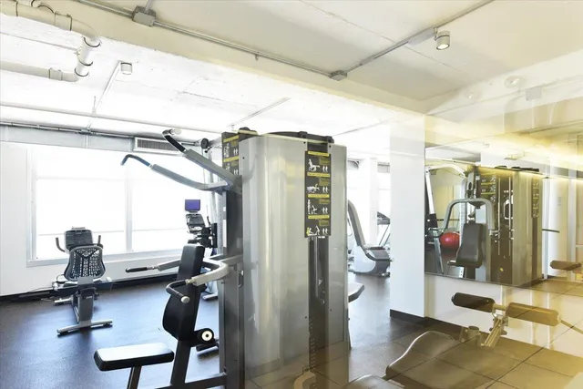 a view of a house with a yard and plants