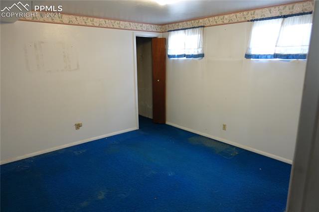 2025 Monterey Road Colorado Springs, CO 80910 - Photo 20 of 32 Basement bedroom