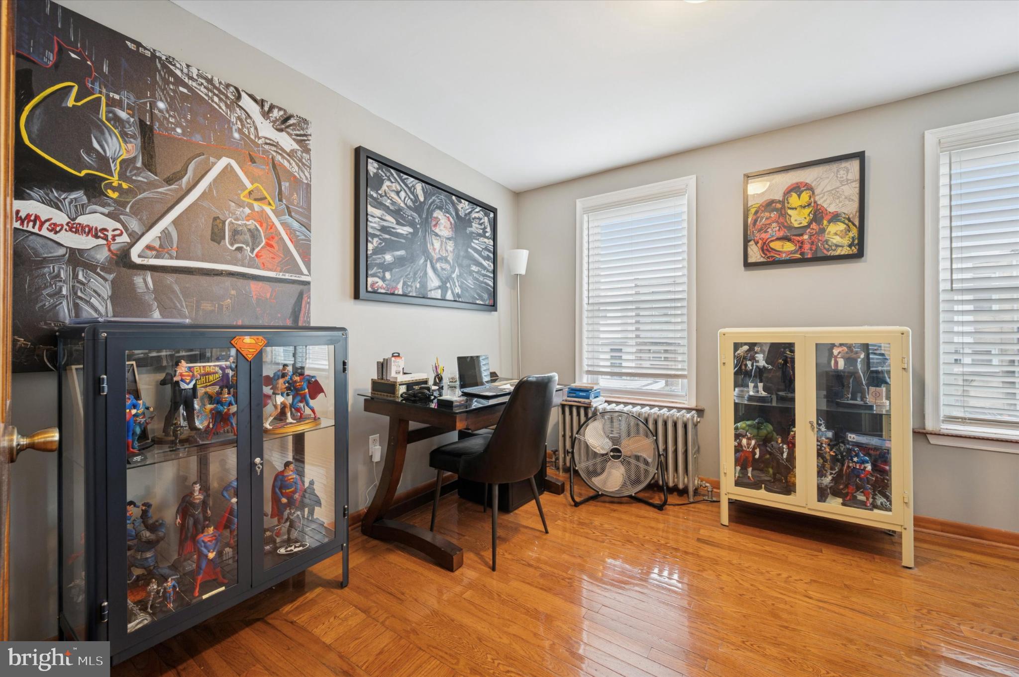 2423 South Millick Street Philadelphia, PA 19142 - Photo 13 of 15 Vibrant superhero-themed workspace retreat.