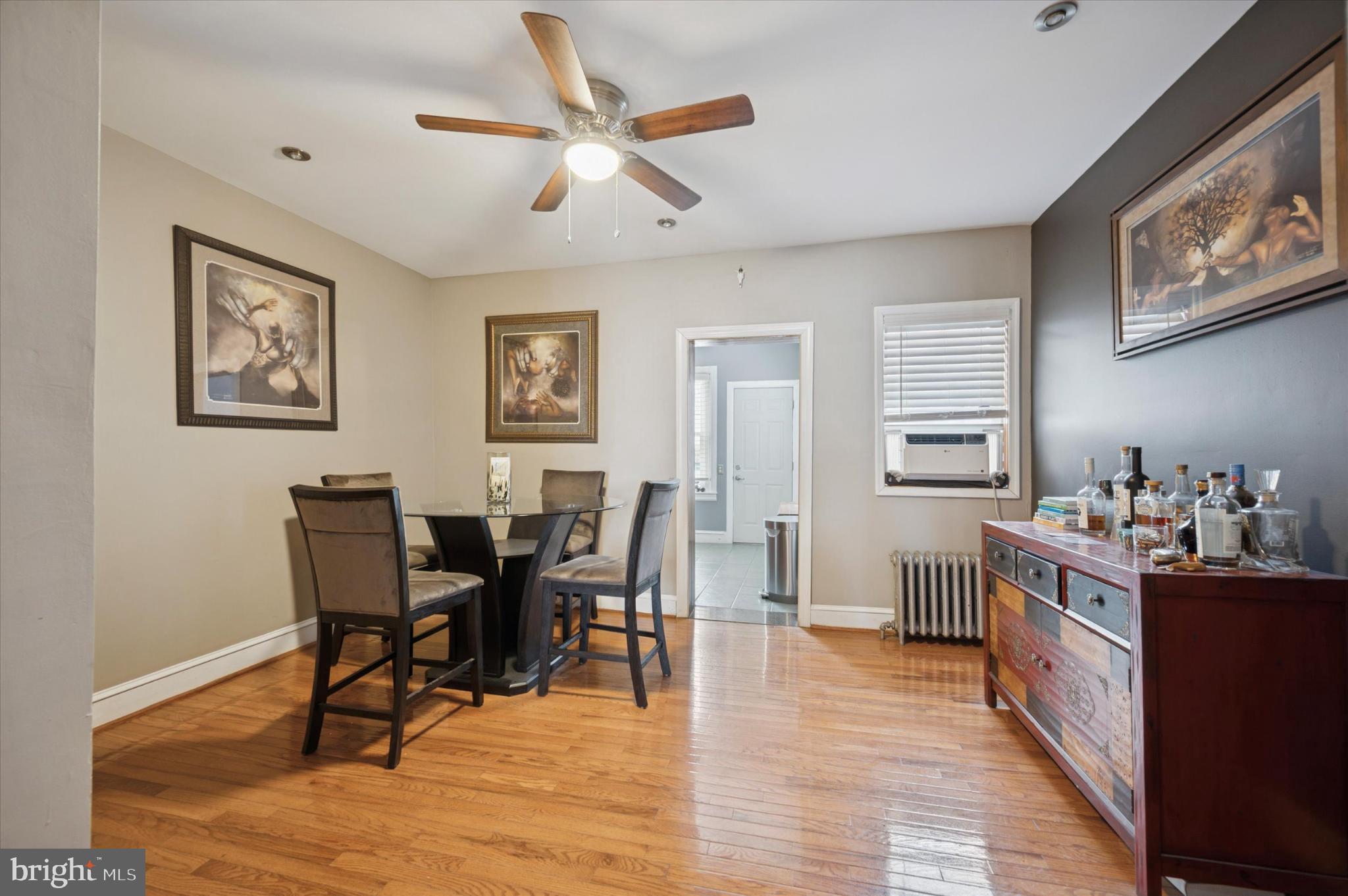 2423 South Millick Street Philadelphia, PA 19142 - Photo 14 of 15 Charming dining area with elegant decor.