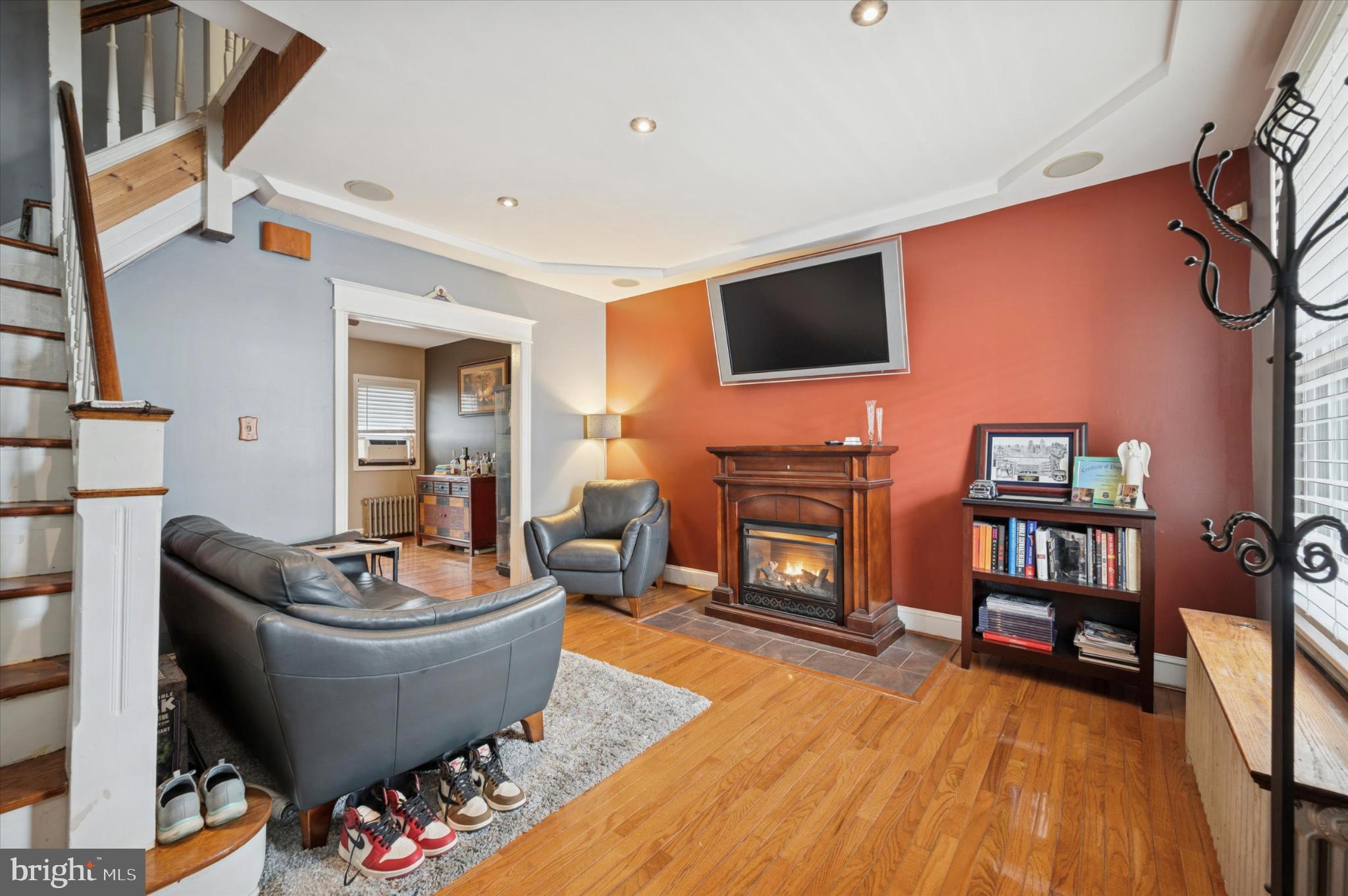 2423 South Millick Street Philadelphia, PA 19142 - Photo 2 of 15 Cozy living space with inviting warmth.