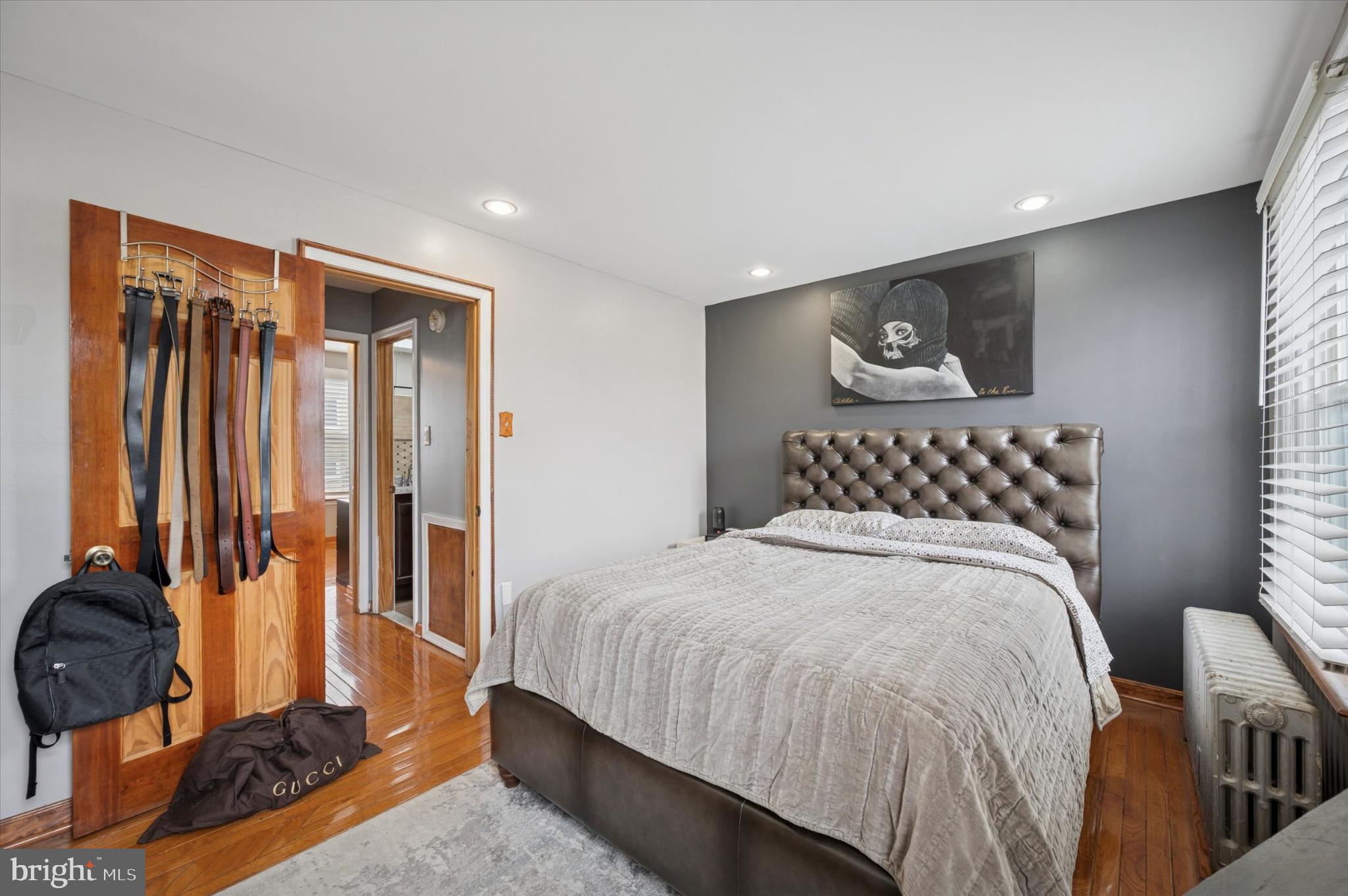 2423 South Millick Street Philadelphia, PA 19142 - Photo 7 of 15 Modern bedroom with stylish decor accents.