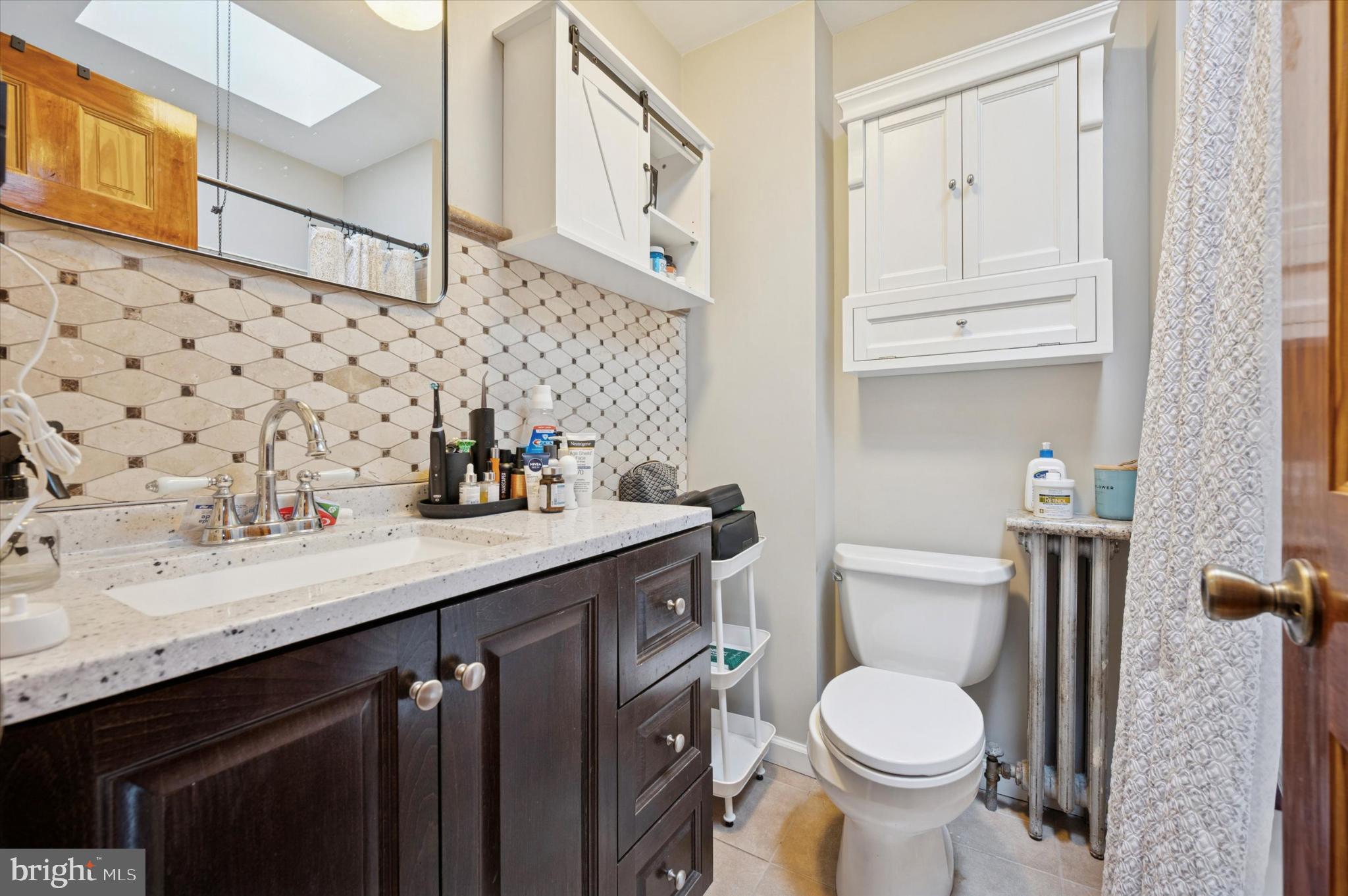 2423 South Millick Street Philadelphia, PA 19142 - Photo 9 of 15 Charming bathroom with modern finishes.