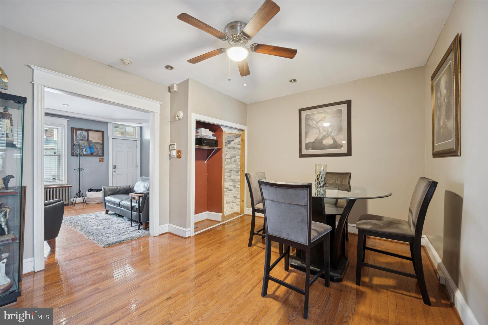 2423 South Millick Street Philadelphia, PA 19142 - Photo 10 of 15 Inviting dining area with warm wood floors.