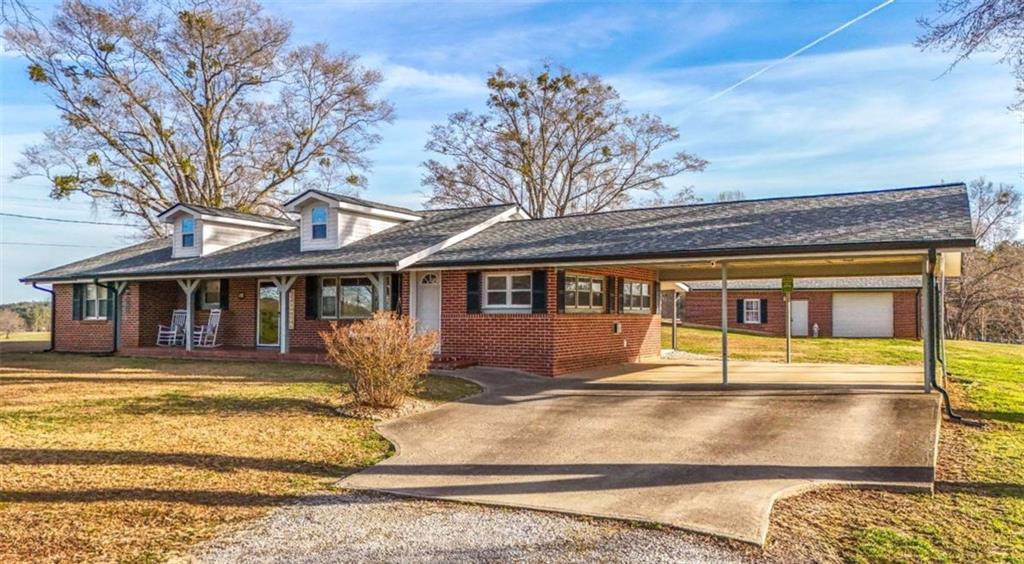 a front view of a house with swimming pool