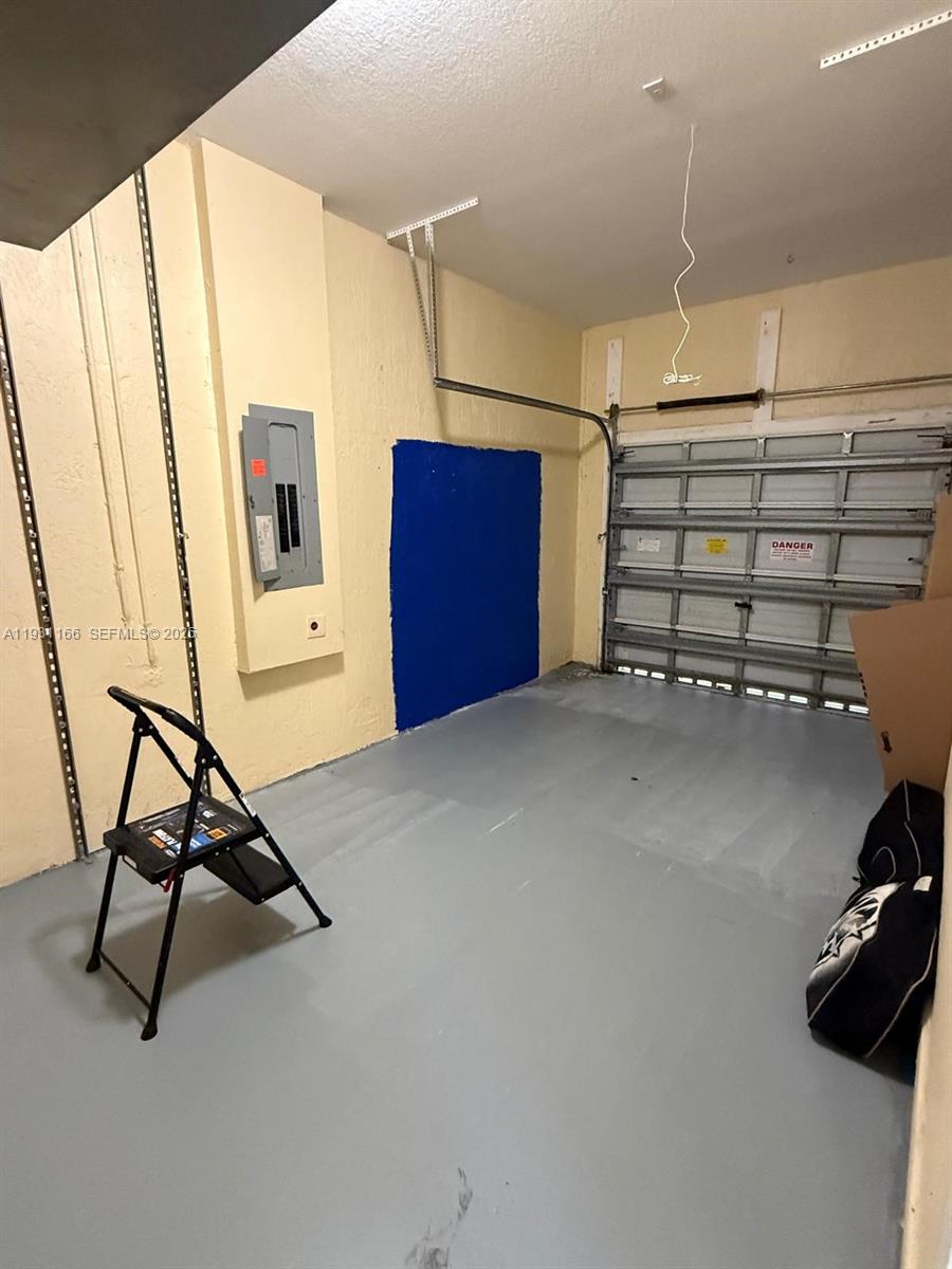 2221 Northeast 37th Terrace Homestead, FL 33033 - Photo 17 of 24 a view of a room with gym equipment