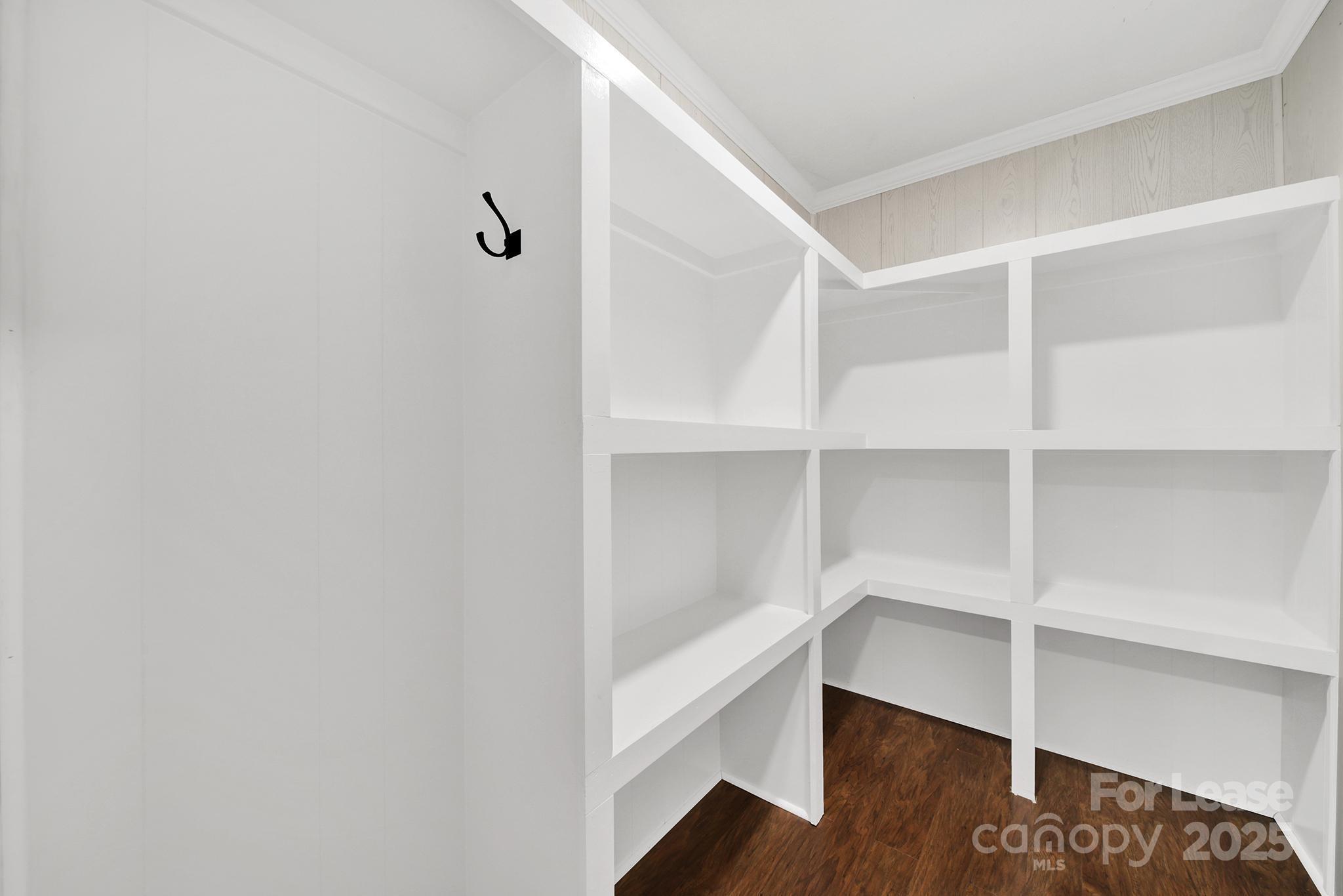 2400 Fox Hollow Road Mint Hill, NC 28227 - Photo 12 of 32 a view of walk in closet with empty racks