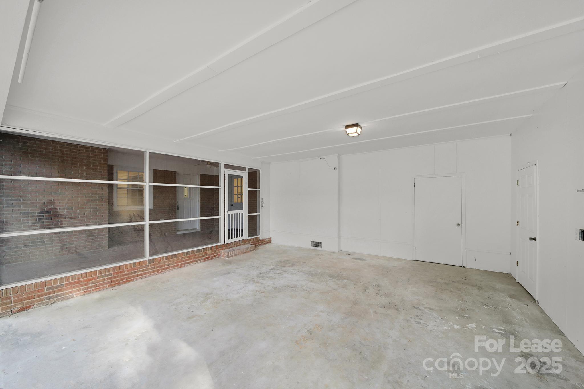 2400 Fox Hollow Road Mint Hill, NC 28227 - Photo 26 of 32 an empty room with a empty space and empty shelves