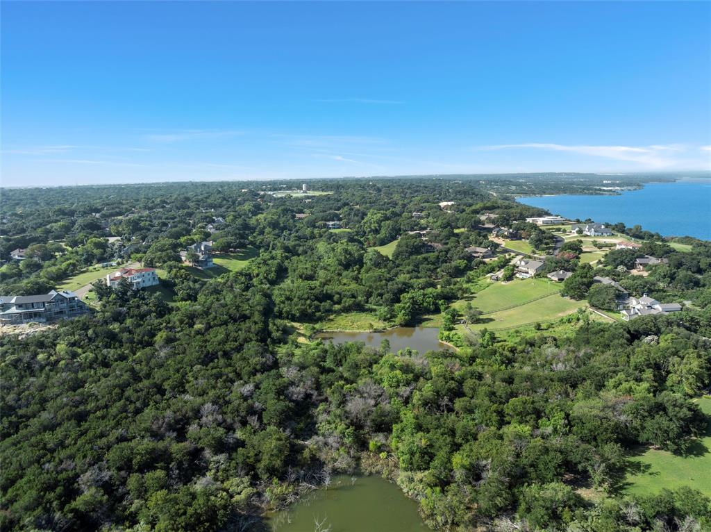 Tbd North Ridge Drive Waco, TX 76710 - Photo 5 of 10 Aerial view of property and surrounding area with a large body of water and a forest