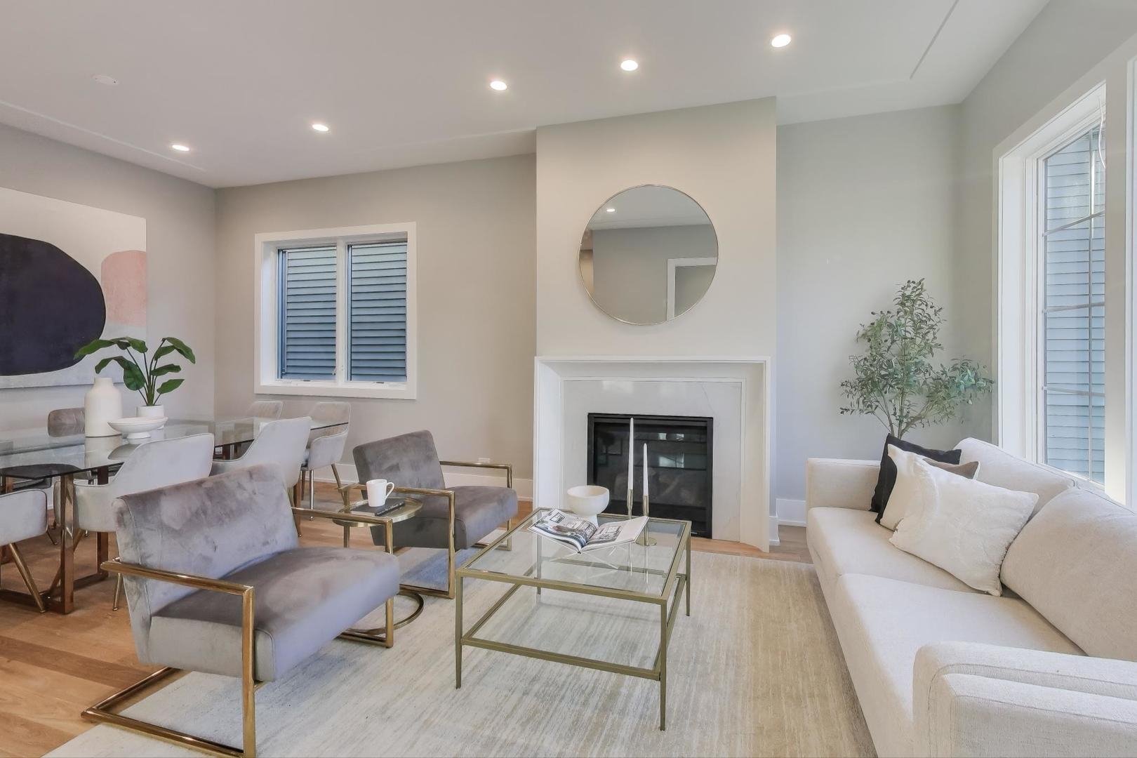 3929 North Francisco Avenue Chicago, IL 60618 - Photo 3 of 47 a living room with furniture and a fireplace