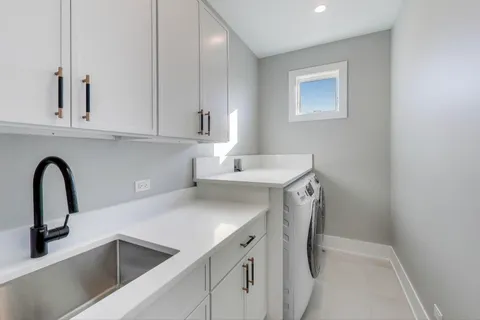 a view of cabinets and a sink