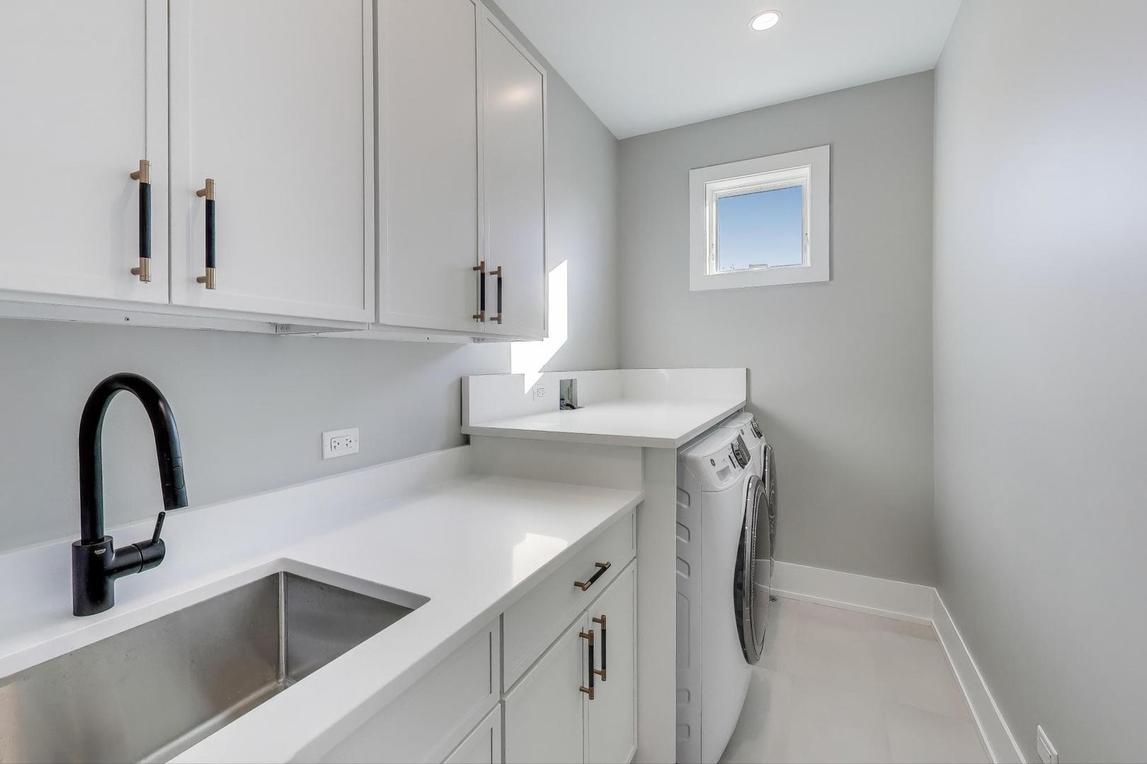 3929 North Francisco Avenue Chicago, IL 60618 - Photo 33 of 47 a view of cabinets and a sink