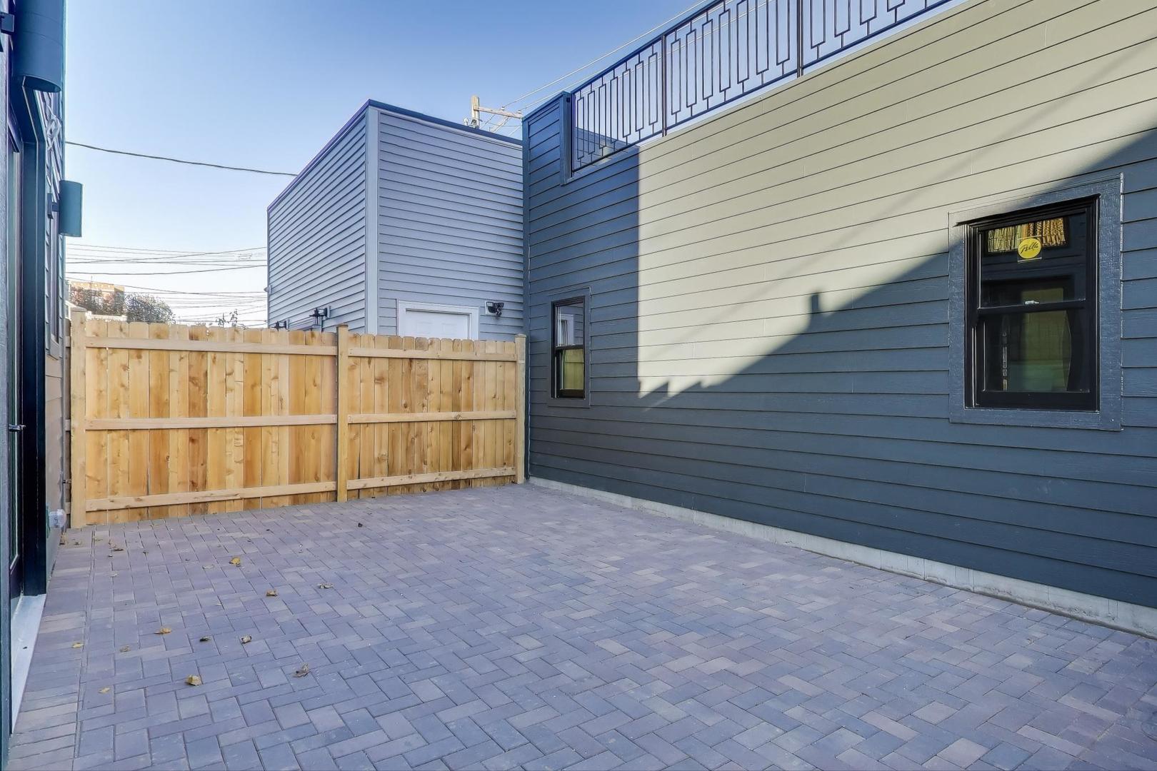 3929 North Francisco Avenue Chicago, IL 60618 - Photo 45 of 47 a view of a house with a backyard