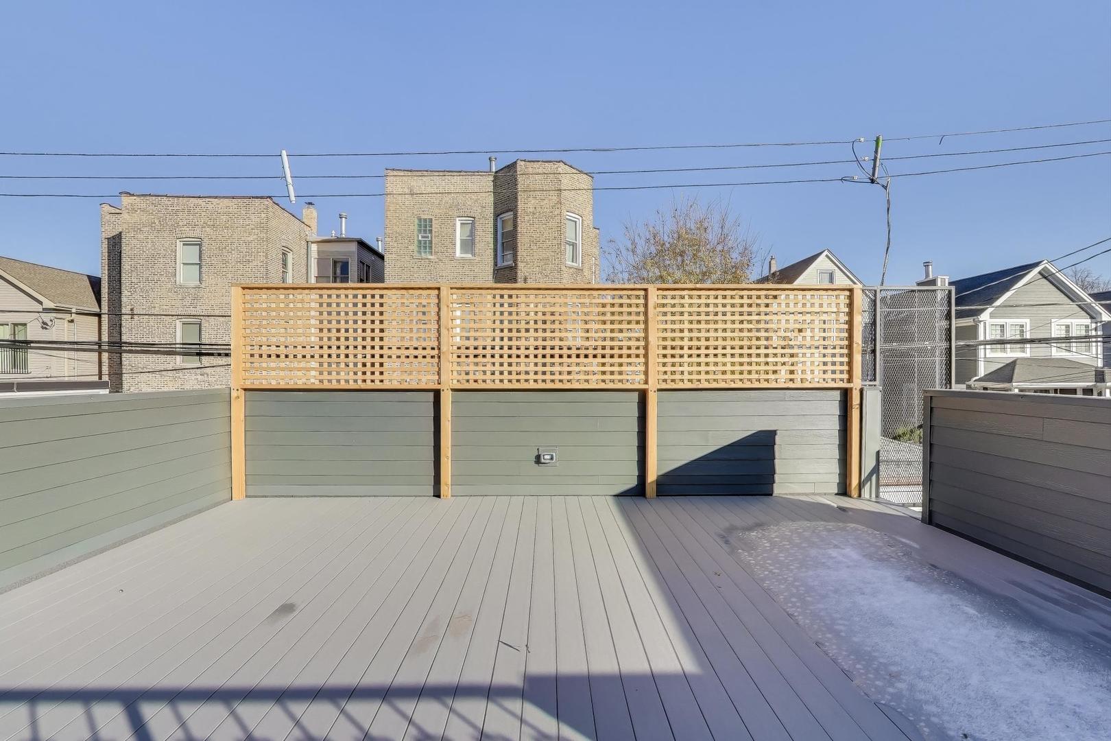 3929 North Francisco Avenue Chicago, IL 60618 - Photo 47 of 47 a view of a bedroom with furniture and wooden floor