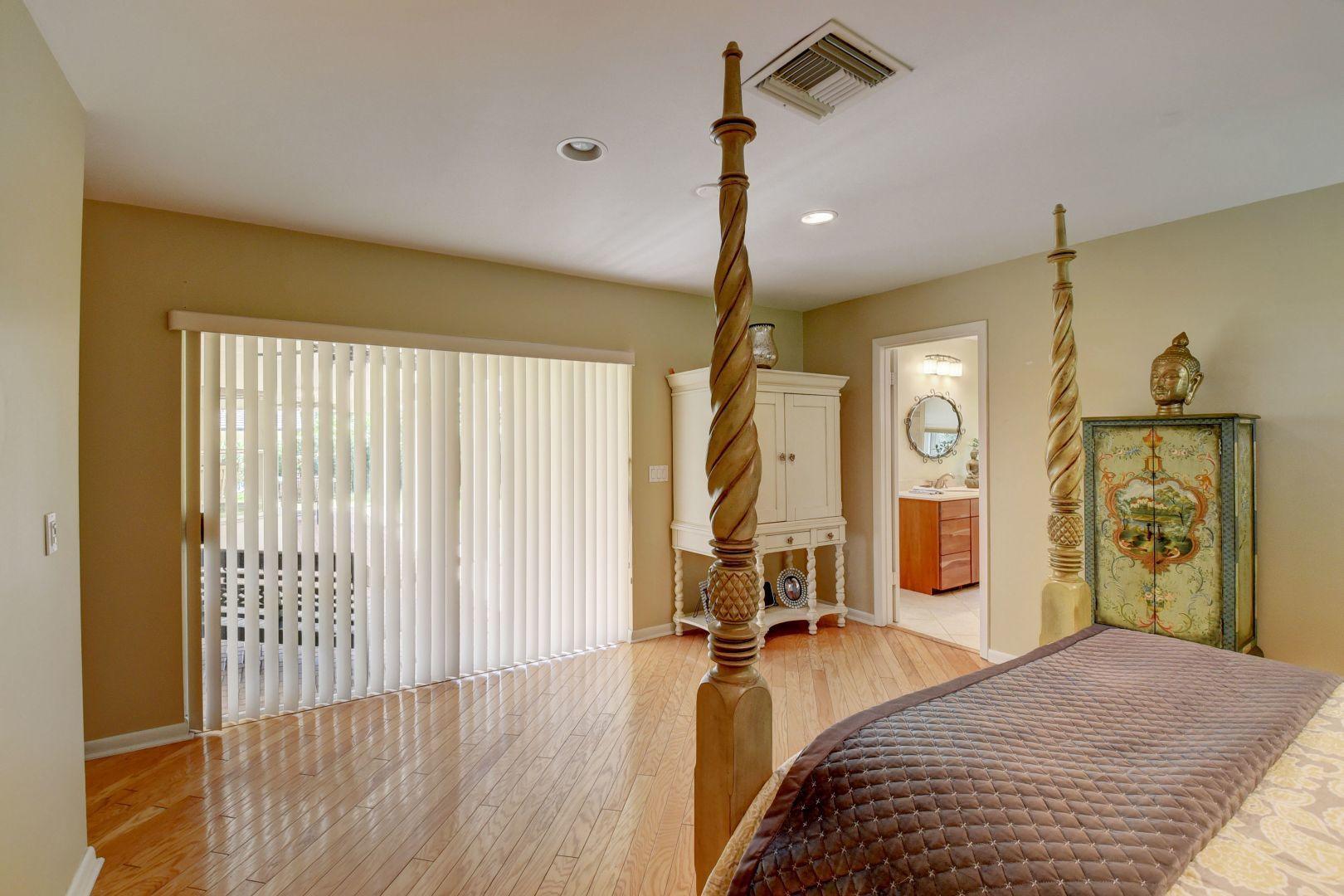 2422 Northwest 36th Street Boca Raton, FL 33431 - Photo 19 of 45 Primary bedroom opens to patio