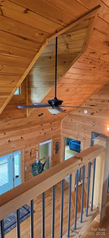 a view of a brick house with a street